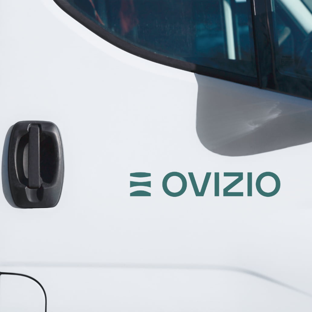Van with an ovizio logo sticker
